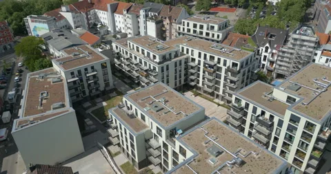 High-angle aerial view of a modern urban residential complex with flat roofs Video stock 330065767