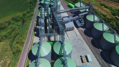 High angle aerial view of modern agricultural silo complex Stock Footage 341285226
