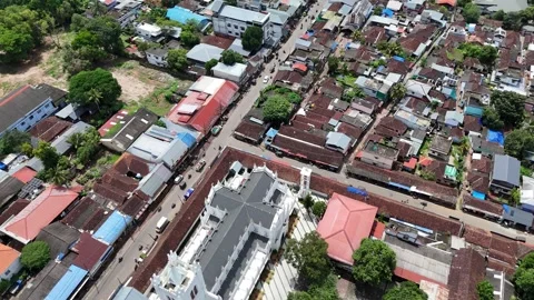High Angle Aerial View of Mount Carmel Cathedral and Convent Road in Alappuzha Stock Footage 341903279