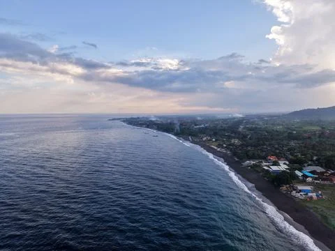 High Angle Aerial View of Ocean Coastline and Black Sand Beach Stock Photos