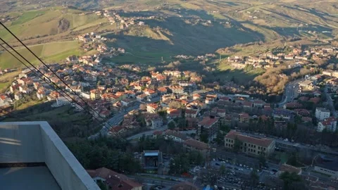 High-angle aerial view over the rooftops of San Marino city Stock Footage 328463185