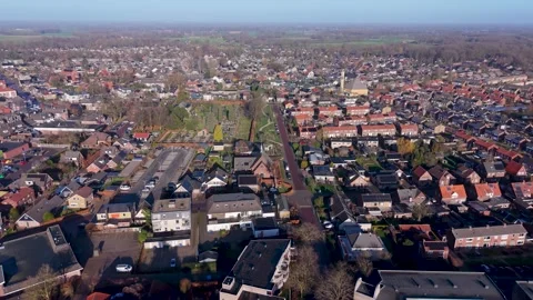 High angle aerial view of a peaceful Dutch town featuring traditional red 스톡 동영상 329801505