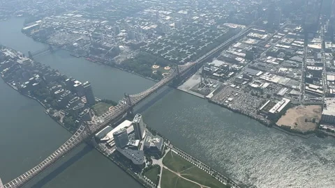 High Angle Aerial View of Queensboro Bridge and Roosevelt Island in New York  Video stock 302909720