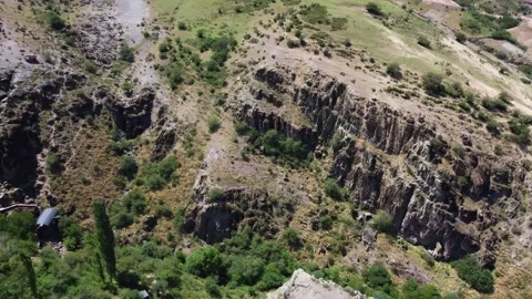 High angle aerial view of rugged basalt cliffs and steep ravines in Kazakhstan Stock Footage 337671177