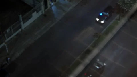 High Angle Aerial View of Vehicles on City Street at Night 動画素材 310333060