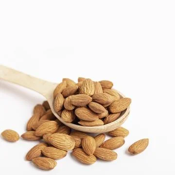 High angle almonds spoon with copy space Stock Photos