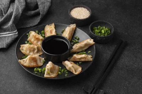 High angle asian dumplings dish with herbs Stock Photos