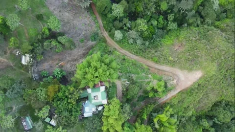 A high angle bird's eye view of a curvy and sharp turning roads Stock Footage 165176828