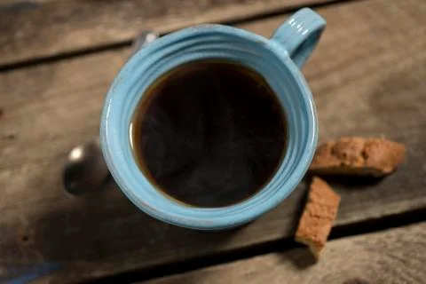 High Angle of Blue Cup Containing Warm Coffee or Tea Stock Photos
