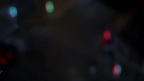 High Angle Blurred Bokeh of Traffic and Street Lights at Night Stockbeeldmateriaal 310332339