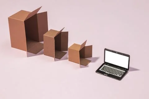 High angle boxes laptop arrangement Stock Photos