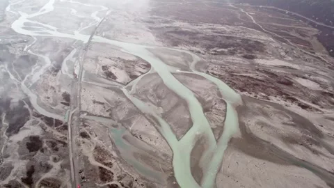 High angle braided river channels and pale sediment patterns in Tibet Stock-Footage 345884294