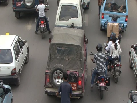 High angle camera tilts up length of traffic jam. Stock Footage 86748765