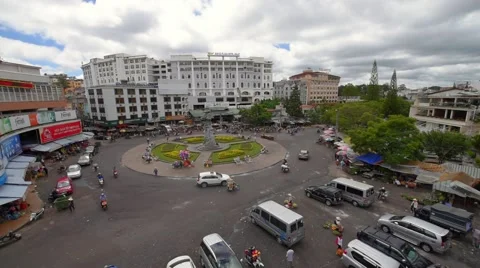 High angle city view with roundabout traffic Stock Footage