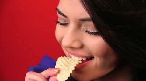 High Angle Close Beautiful Brunette Woman Model Eat Potato Chip Snack Food Stock Footage 22410538
