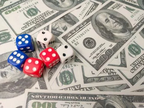 A high-angle, close-up conceptual image featuring a variety of colorful dic.. Stock Photos