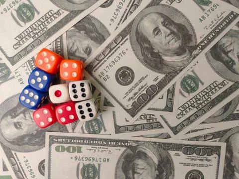 A high-angle, close-up conceptual image featuring a variety of colorful dic.. Stock Photos