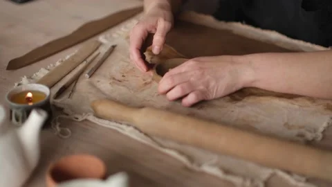 High angle close up of female ceramist sculpts a bowl Stock Footage 236372064