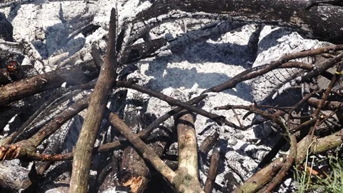 High-angle close-up of a fire pit filled Stock Footage 347076160