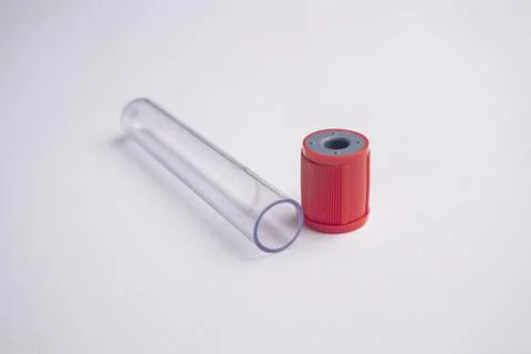 High-angle, close-up shot of an empty medical blood collection tube lying h.. Stock Photos
