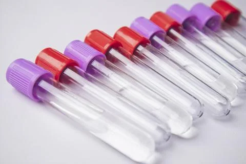 High-angle, close-up shot of several empty medical blood collection tubes w.. Stock Photos
