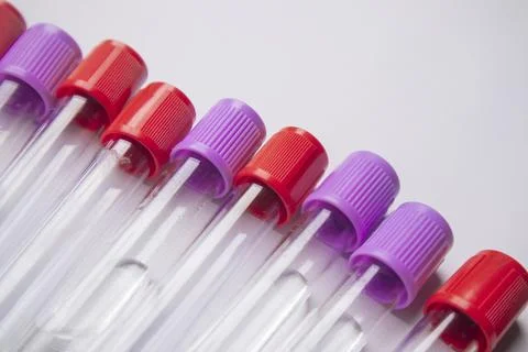 High-angle, close-up shot of several empty medical blood collection tubes w.. Stock Photos
