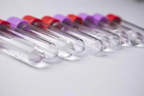 High-angle, close-up shot of several empty medical blood collection tubes w.. Stock Photos