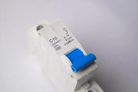 High-angle, close-up shot of a white C10 miniature circuit breaker featurin.. Stock Photos