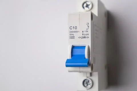 High-angle, close-up shot of a white C10 miniature circuit breaker featurin.. Stock Photos