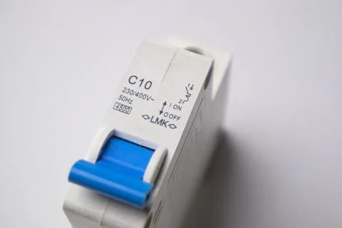 High-angle, close-up shot of a white C10 miniature circuit breaker featurin.. Stock Photos