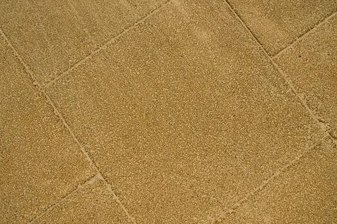 High angle close up shot of a yellow textured rubber flooring with geometri.. Foto stock