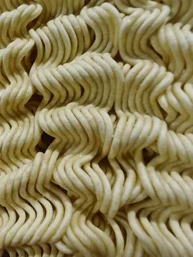 High Angle Close-up of Uncooked Instant Noodle Block Texture copy Stock Photos
