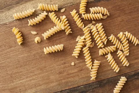 High-angle close-up view of raw fusilli pasta Stock Photos