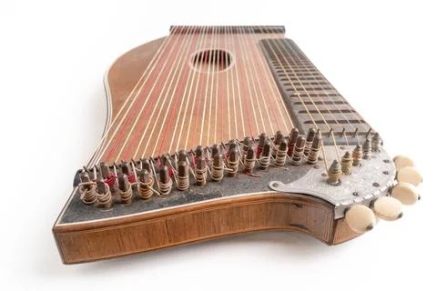 High angle closeup horizontal studio shot of vintage, old wooden zither isolated Stock Photos