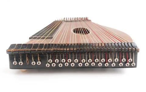 High angle closeup horizontal studio shot of vintage, old wooden zither isolated Stock Photos