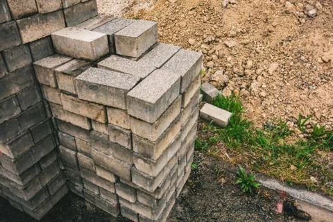 High angle closeup shot of bricks stacked on each other Foto stock