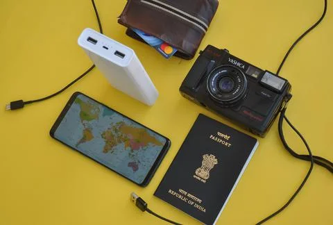 High angle of collecting essential things of travel for international traveling Foto stock