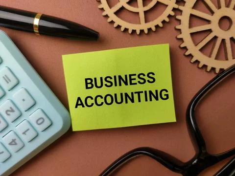 A high-angle, conceptual flat lay featuring a bright lime green sticky note.. Stock Photos