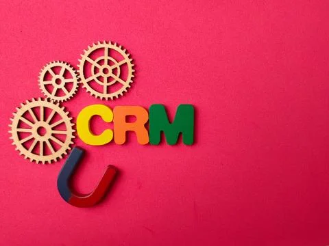 A high-angle conceptual flat lay featuring the acronym CRM Customer Relatio.. Stock Photos