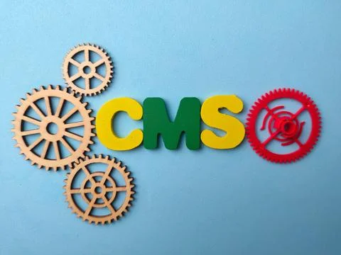 A high-angle conceptual flat lay featuring the acronym CMS Content Manageme.. 写真素材