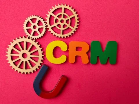 A high-angle conceptual flat lay featuring the acronym CRM Customer Relatio.. Stock Photos