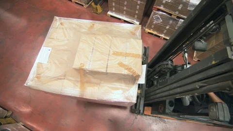 High angle crane shot of a forklift working in a large warehouse Video stock 71632897