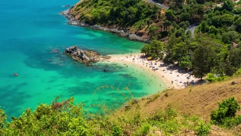 High-angle daytime timelapse overlooking tourists at the scenic Yanui Beach Video stock 348160223