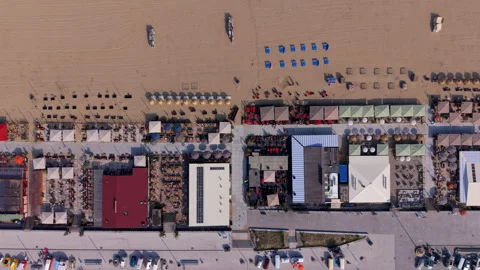 High angle directly overhead top down aerial perspective of seaside beach Stock Footage 340531374