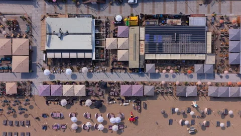 High angle directly overhead top down aerial perspective of seaside beach Stock Footage 340531389