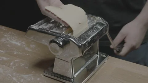 High angle of dough in a pasta maker Stock Footage 149112597