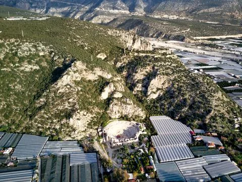 High angle drone aerial view of ancient greek rock cut lykian empire amphithe Foto stock