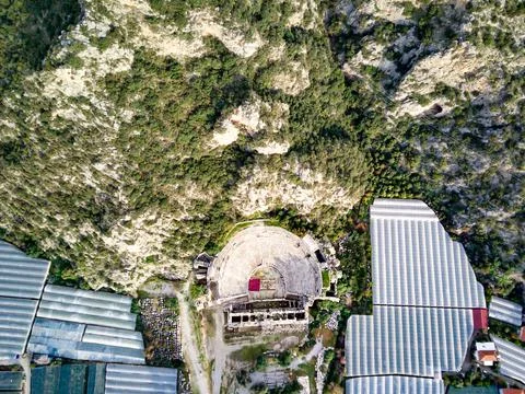 High angle drone aerial view of ancient greek rock cut lykian empire amphithe Foto stock