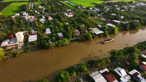 High angle drone flight over countryside canal showing river and road transpo Stock-Footage 342926776