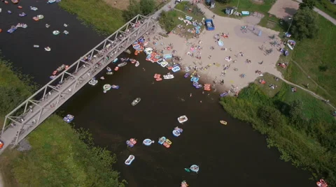 High angle Drone fly over in Finnish beer float event Stock Footage 45173833